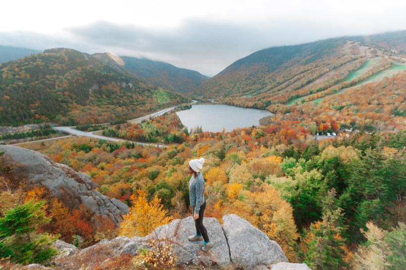Girl standing on top of Artists Bluff in fall-2