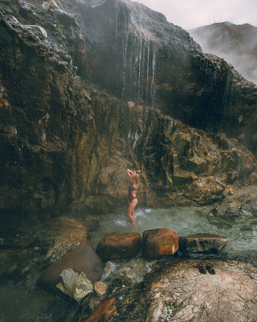 girl soaking in Kirkham hot springs idaho