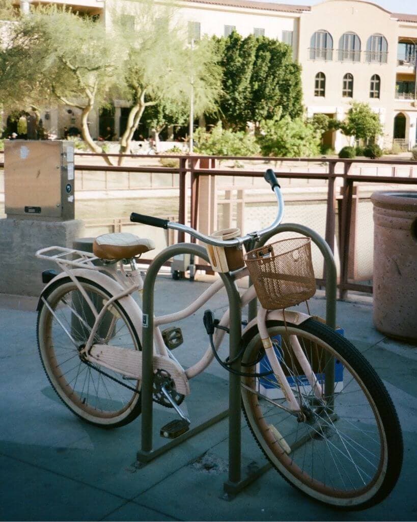 picture of a pink bike in front of the scottsdale waterfront