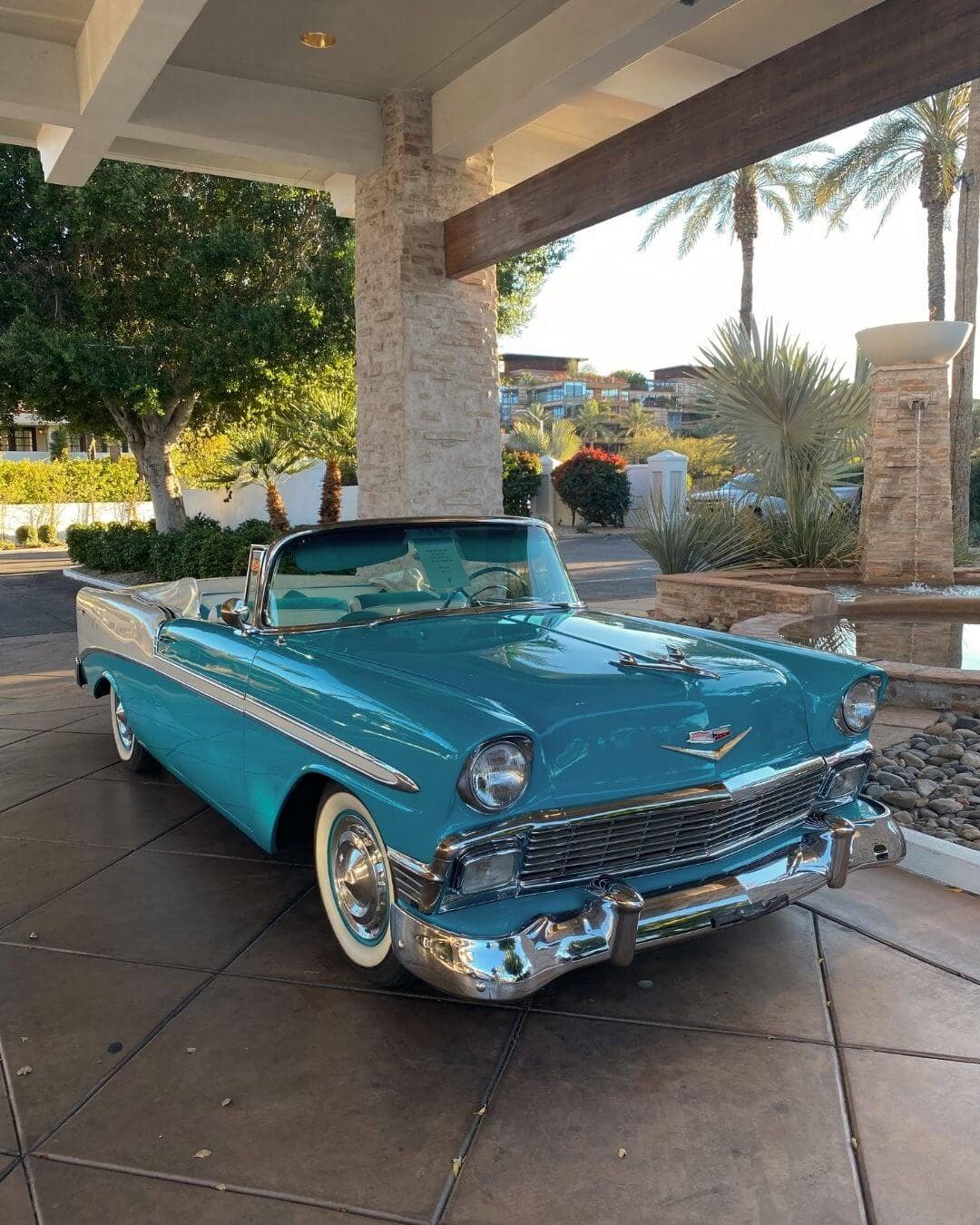 blue convertible in front of the scott resort and spa in scottsdale az
