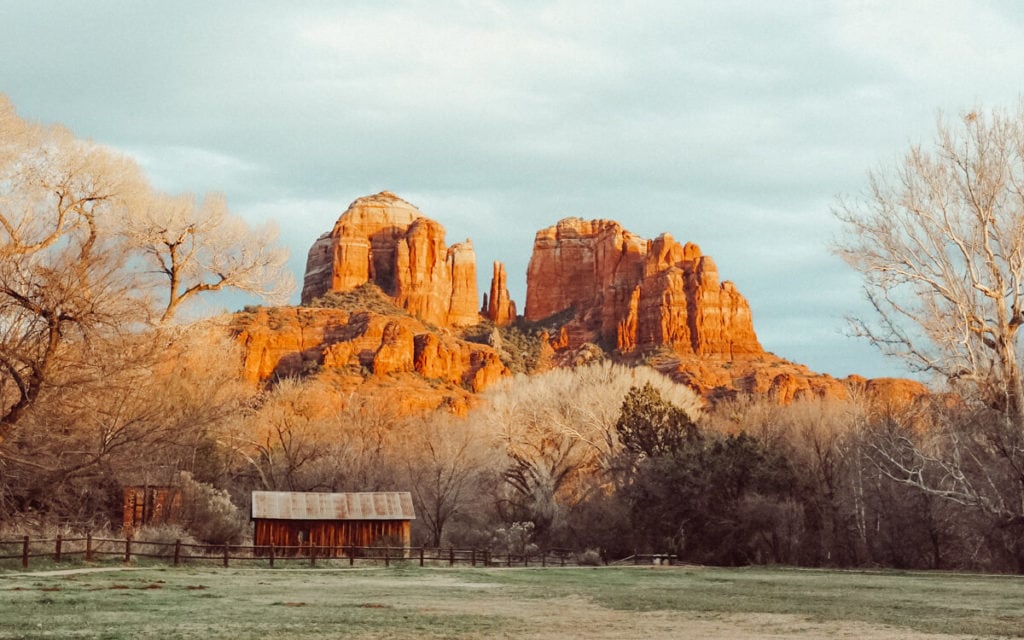 bright red sunset on cathedral rock from crescent moon picnic site sedona az