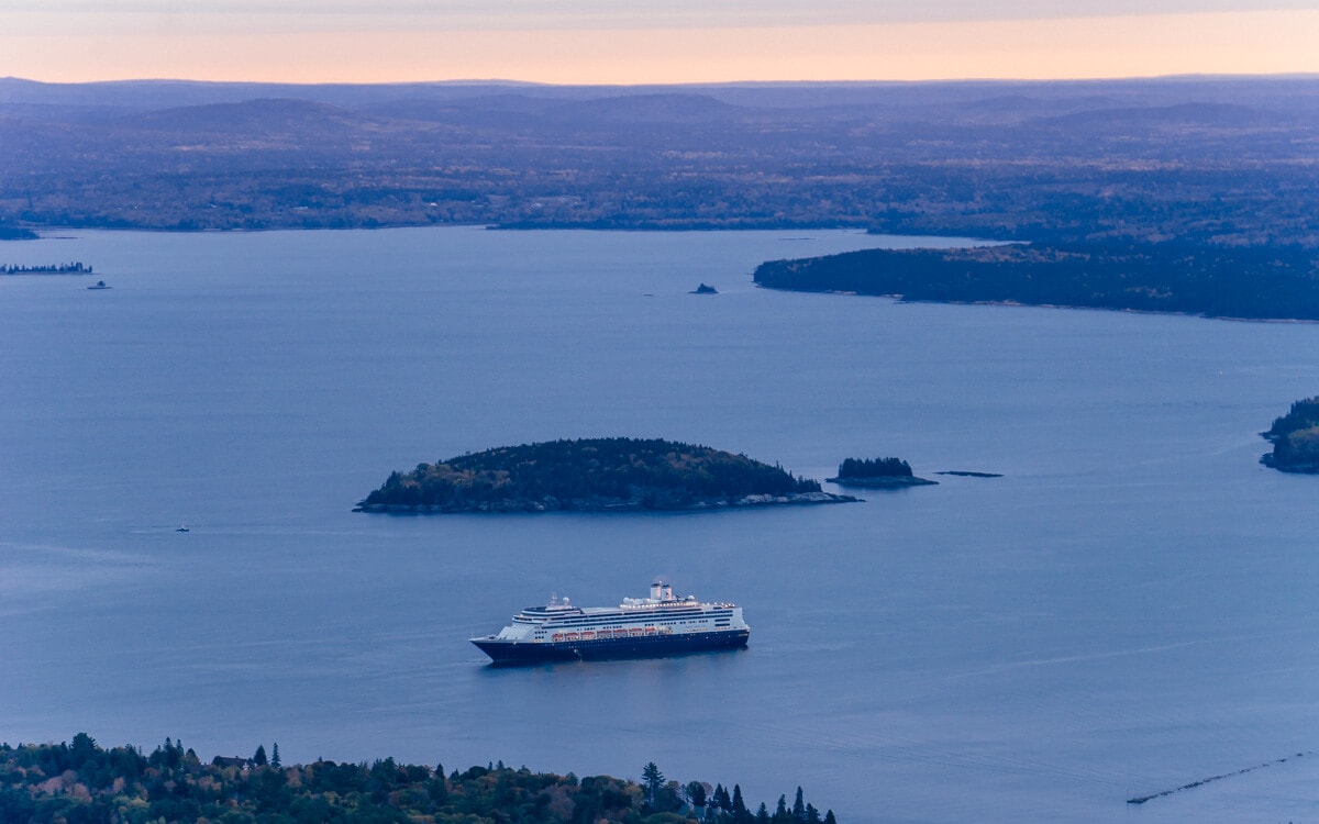view of a cruise ship at sunrise from the top of cadillac mountain road acadia national park maine
