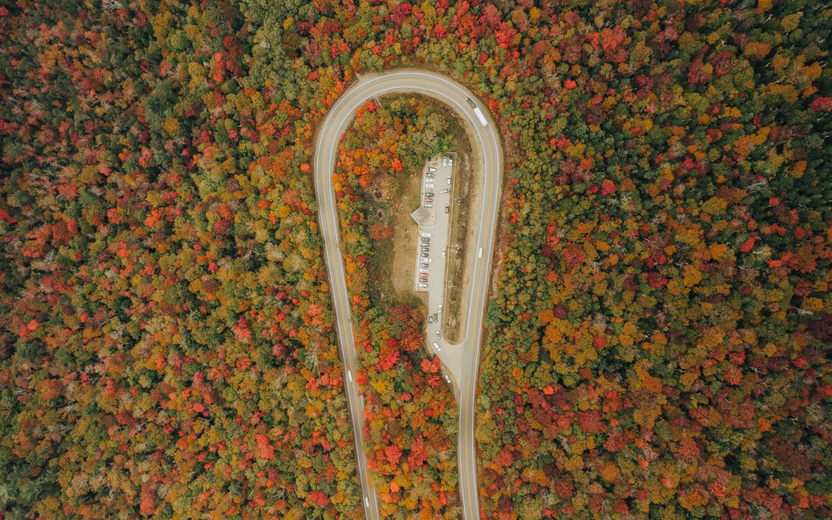 fall foliage over the kancamagus highway hairpin turn