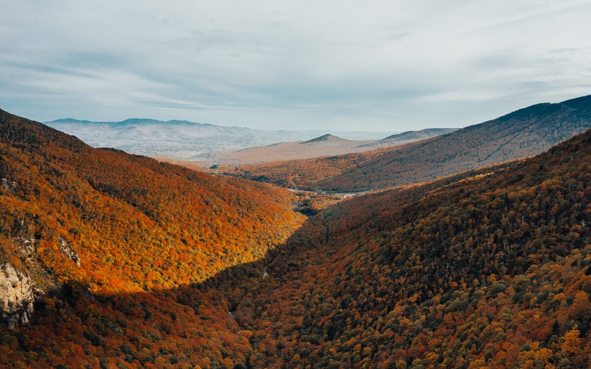 aerial view of fall foliage in the mountains around stowe vermont
