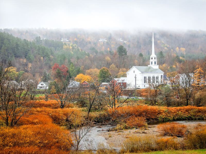 view of fall fog over stowe vermont