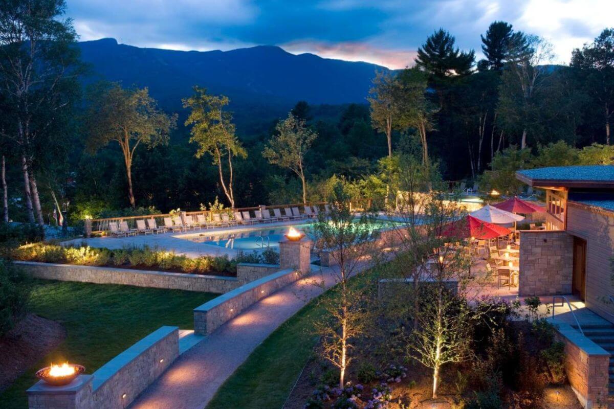 photo of the outdoor pool at the topnotch resort in stowe vermont in the evening