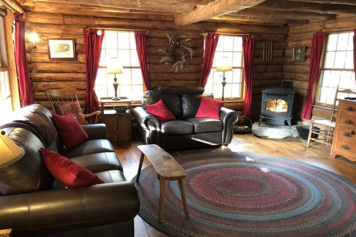 inside a cozy log cabin rental in north conway new hampshire