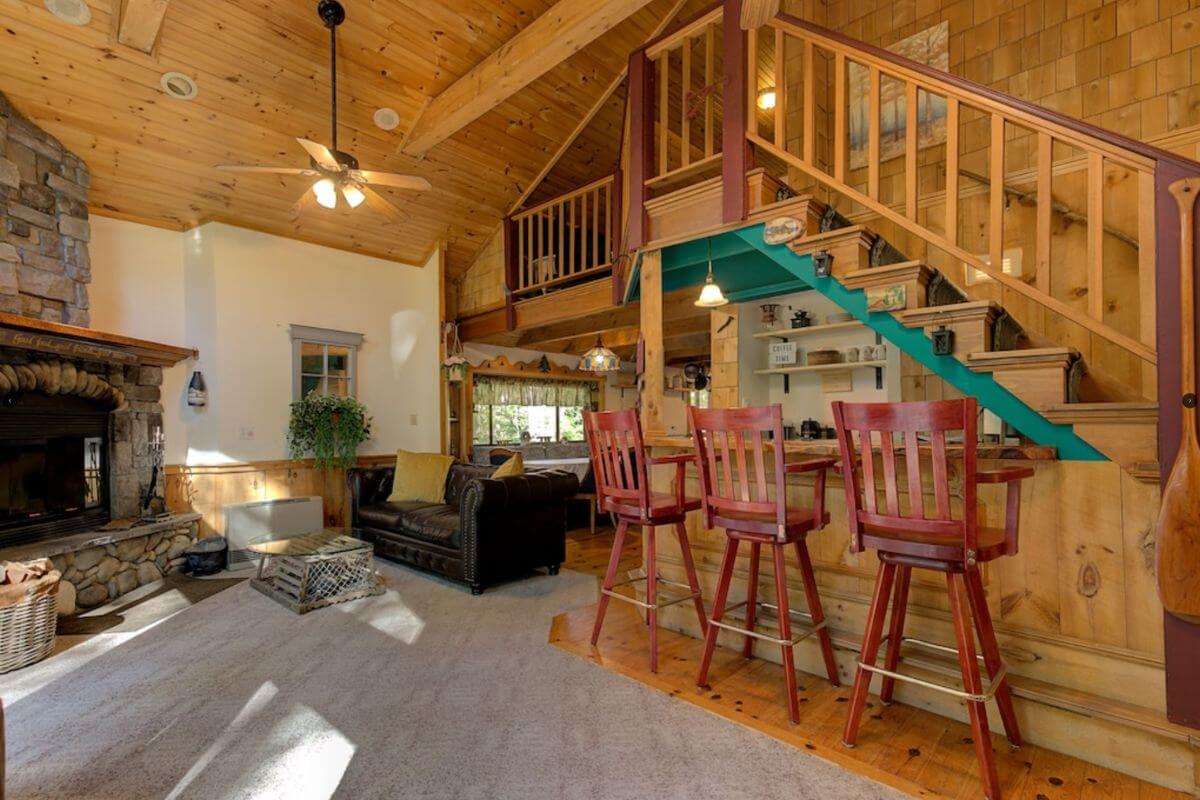 inside a cozy wooden cabin rental in north conway new hampshire