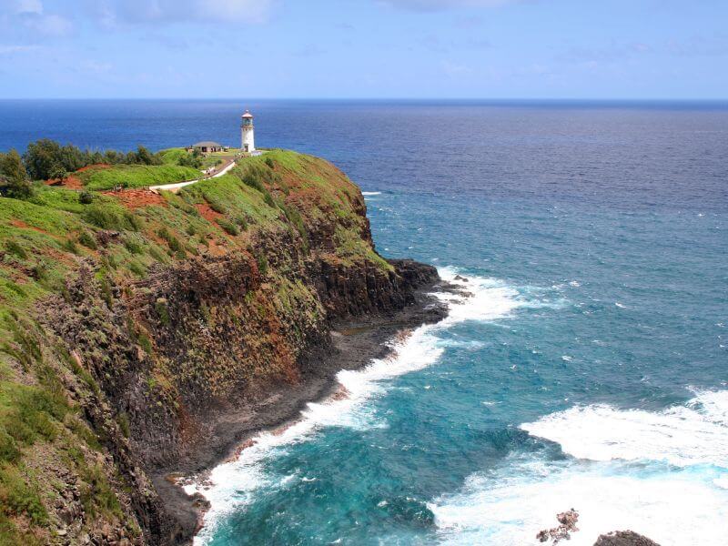 sunny day and blue sky over kilauea lighthouse on the kauai hawaii coast