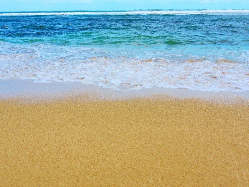 clear blue water on larsen's beach in kauai hawaii