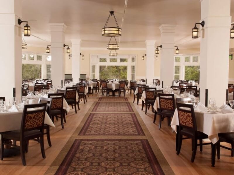 bright interior of the lake hotel dining room in yellowstone national park