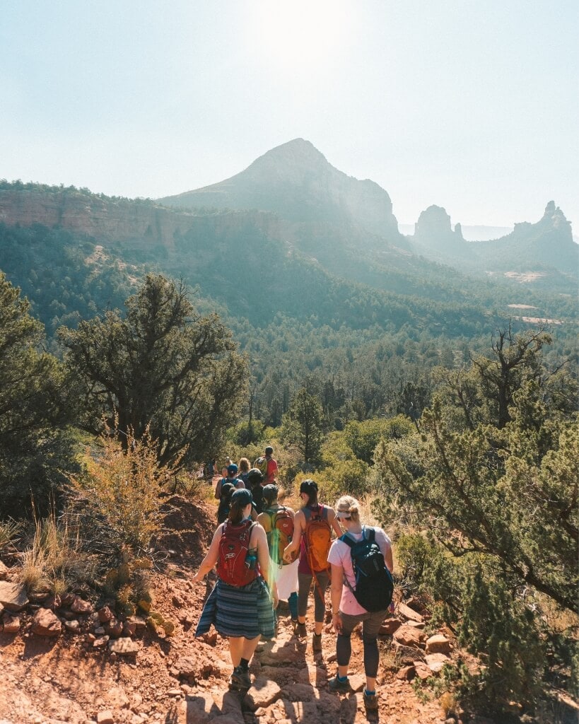 female hikers looking at the red rock views from jordan trail sedona