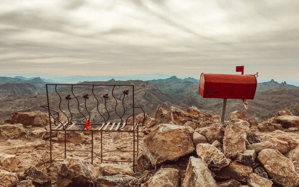 wire bench and red mailbox at the top of picketpost mountain az 