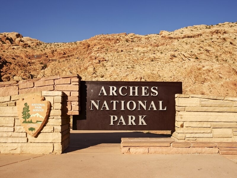 brown arches national park sign utah