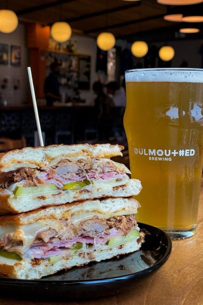 sandwich with beer at foulmouthed brewing portland