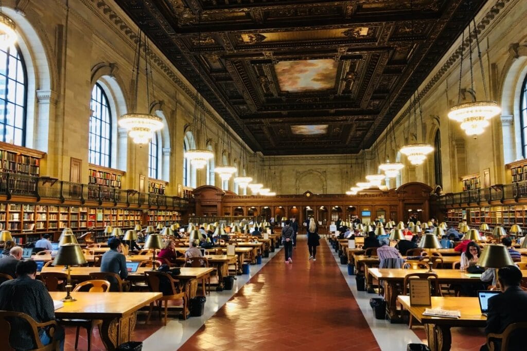 people studying inside the New York Public Library