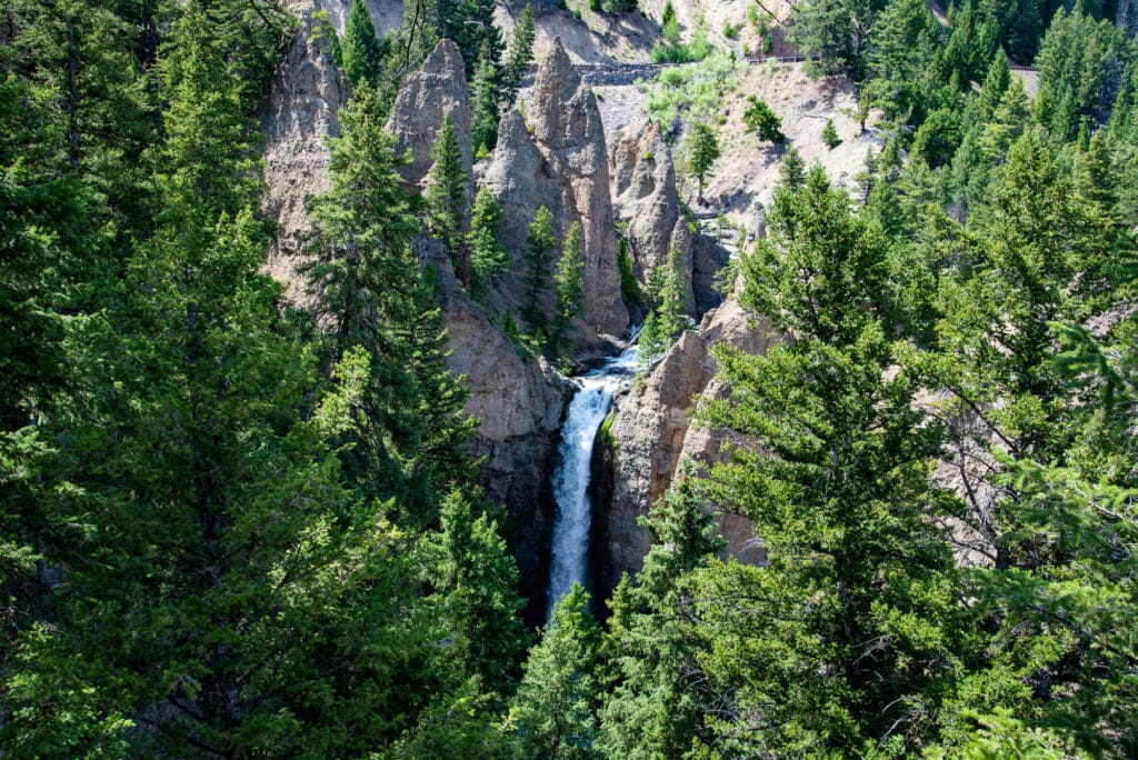 sunny day over tower falls in yellowstone national park