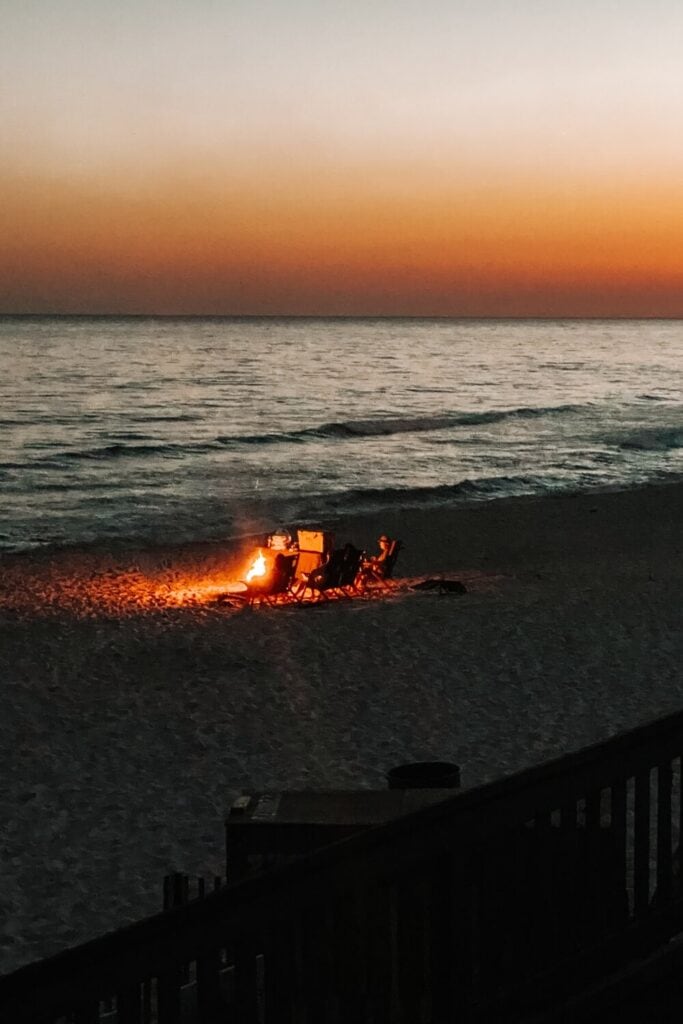 person having a bonfire on rosemary beach florida