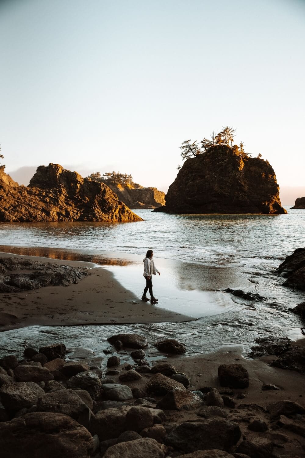 girl exploring sunset at secret beach samuel h boardman oregon