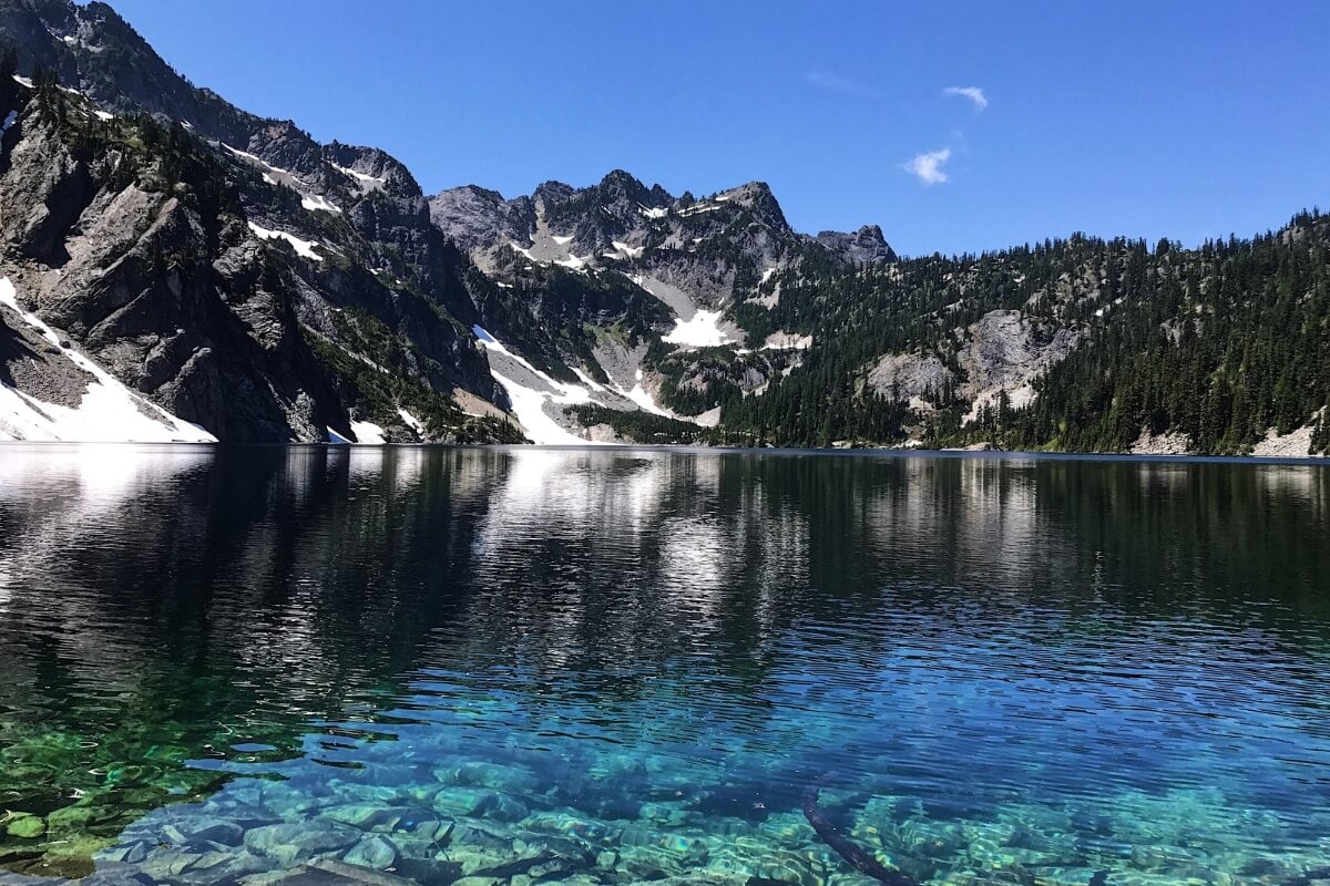 sunny day over snow lake alpine lake hike in washington