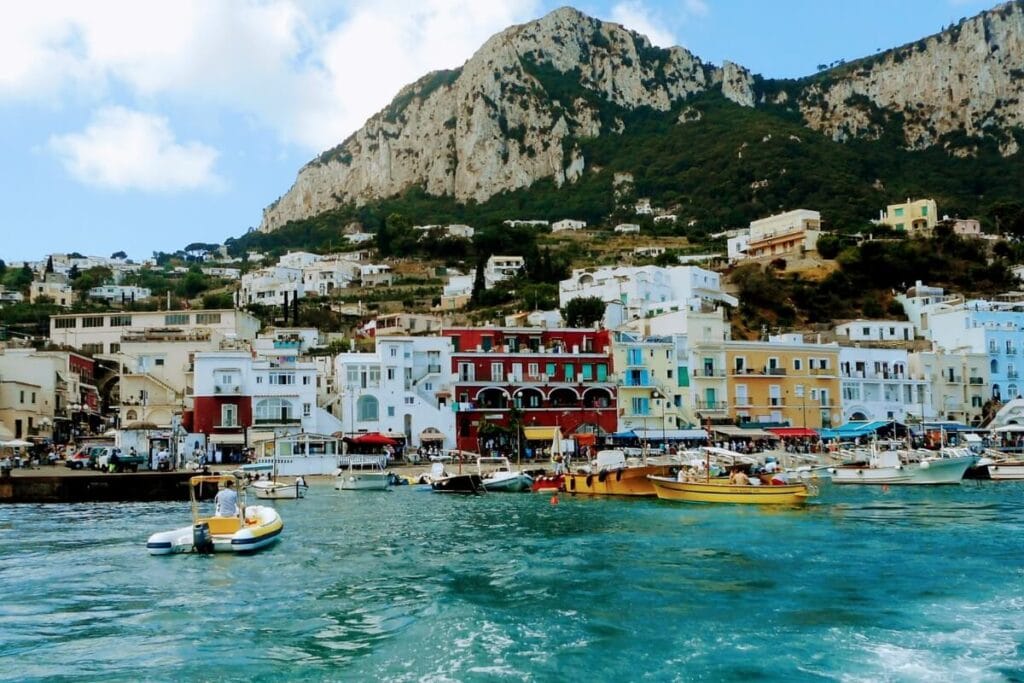 view of capri italy red building from a boat