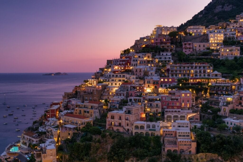 sunset glowing over positano italy